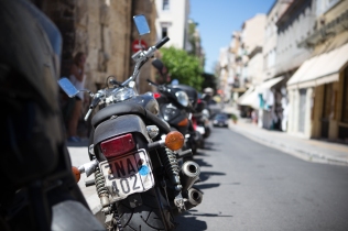 Motorcycles line the street in Plaka